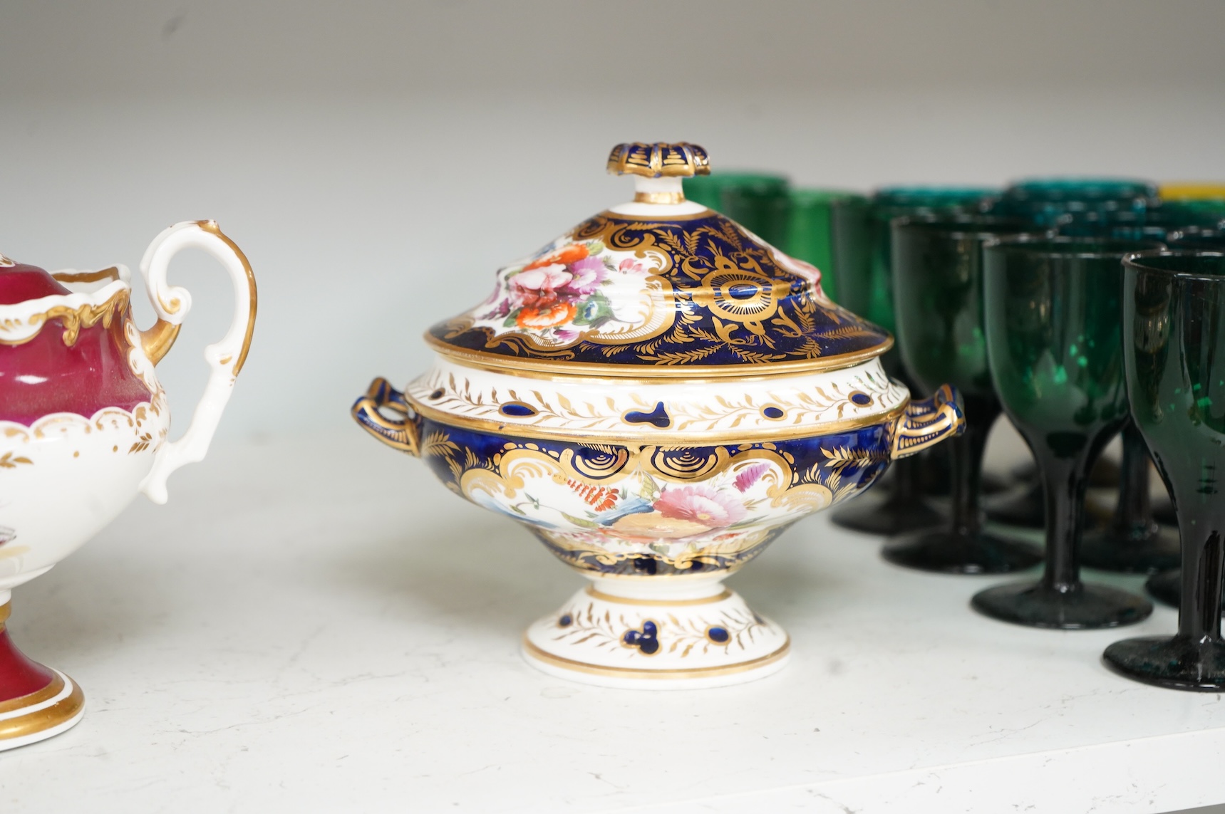 A Group of early 19th century English porcelain; to sauce tureens and covers, one with stand, a covered sugar bowl, a two handled vase, a pot pourri vase and cover, a milk jug and a hydra shaped jug, largest 16cm high